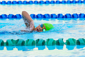 Swimmer child swims freestyle swimmi