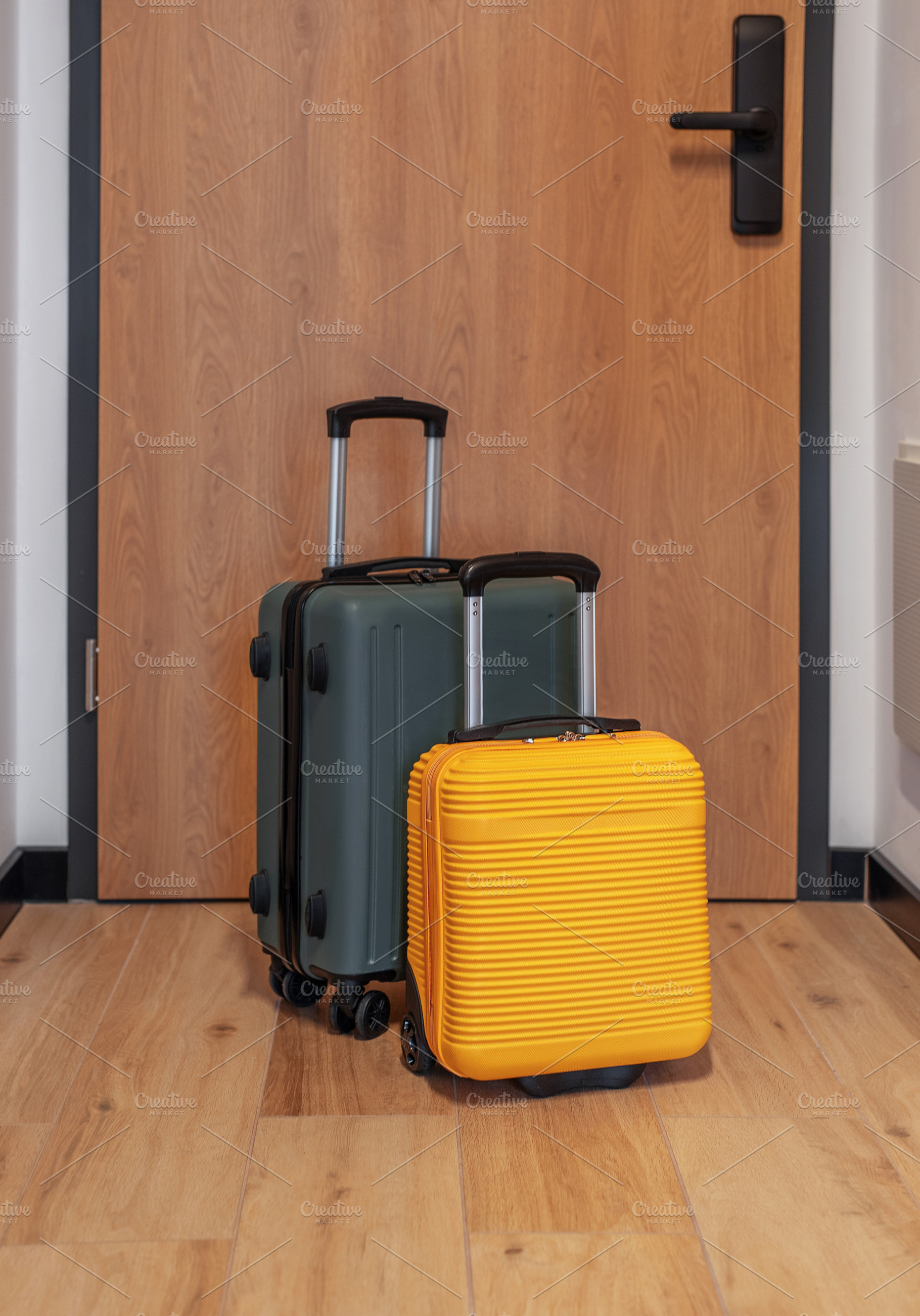 Luggage standing ready for travel vacation or business trip, a Holiday Photo by Olena Rudo