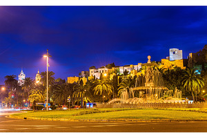 Tres gracias fountain and alcazaba castle in malaga adalusia spain, an Architecture Photo by Leonid Andronov