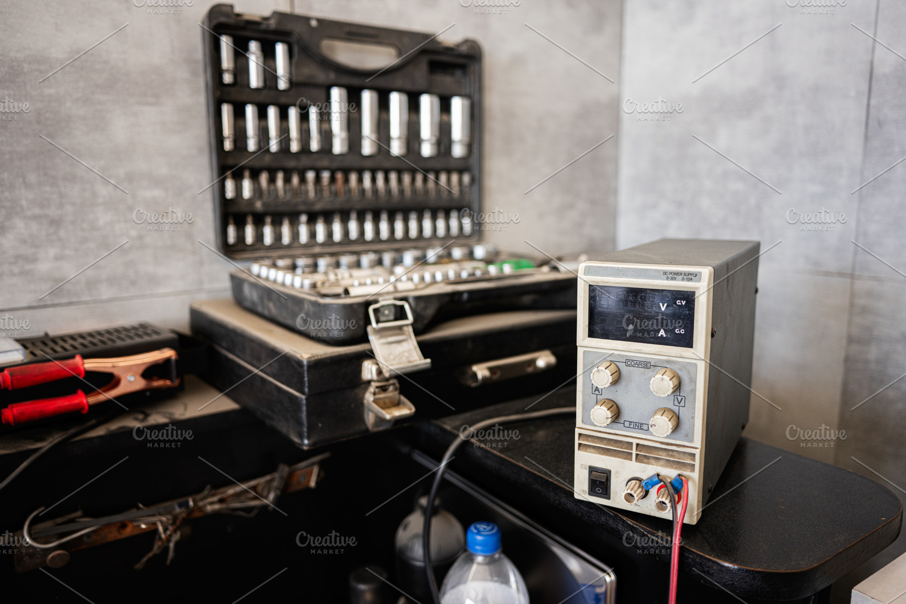 Closeup of tools and equipment on a workspace table in a workshop, a Photo by AS photostudio