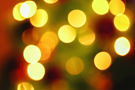 Blur light celebration christmas tree with brown wall background, a Holiday Photo by Detriana