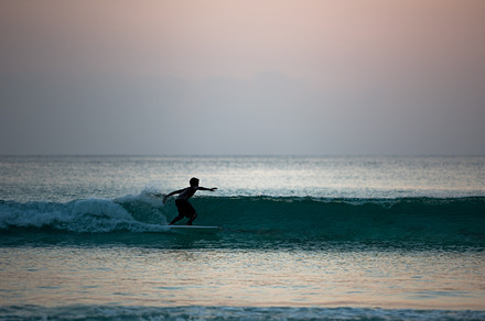 Boy surfing on a board, a Nature Photo by Dvoevnore photos