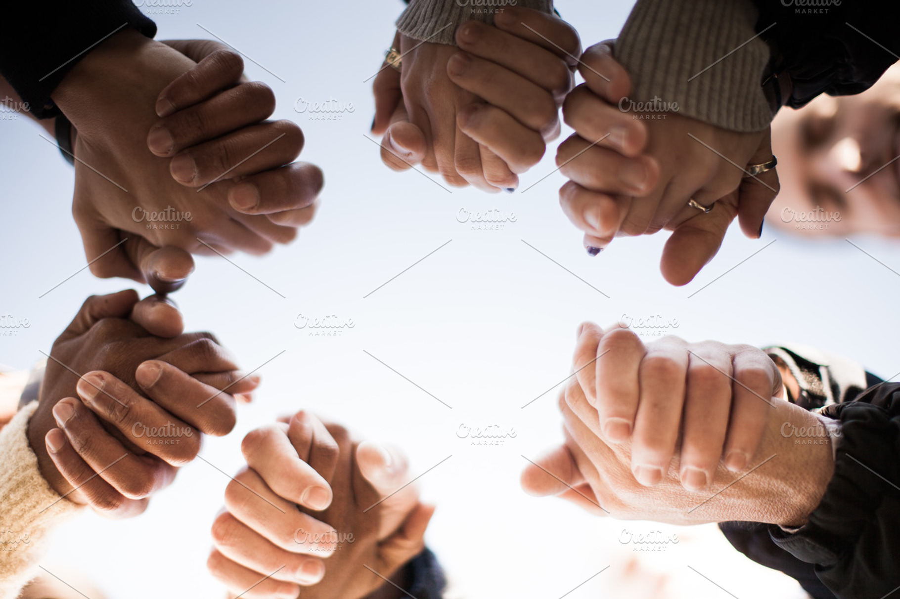 Praying together containing community group, community, and religion, a Person Photo by Lightstock