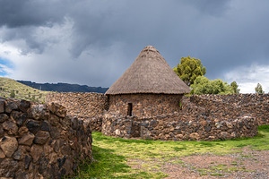 Traditional Thatched-Roof Hut at the Archaeological Site of Raqc, an Architecture Photo by GoodGoods