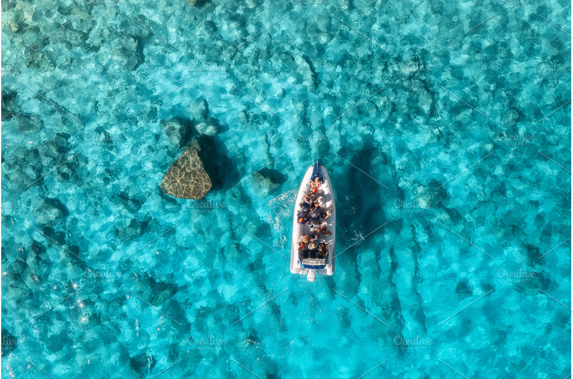 Aerial view of boat with people in, a Nature Photo by den-belitsky