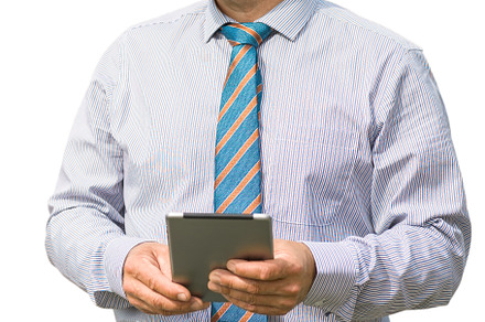 Businessman with tablet in hands on white background isolate, a Business Photo by oleghz