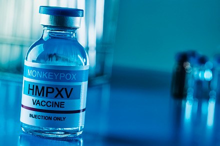 simulated monkeypox vaccine vial, web banner, a Photo by Nito
