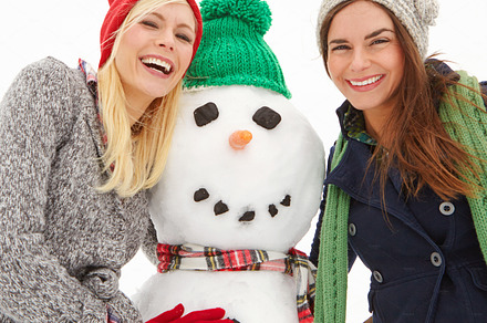 Keeping the snowman company, a Photo by Peopleimages.com