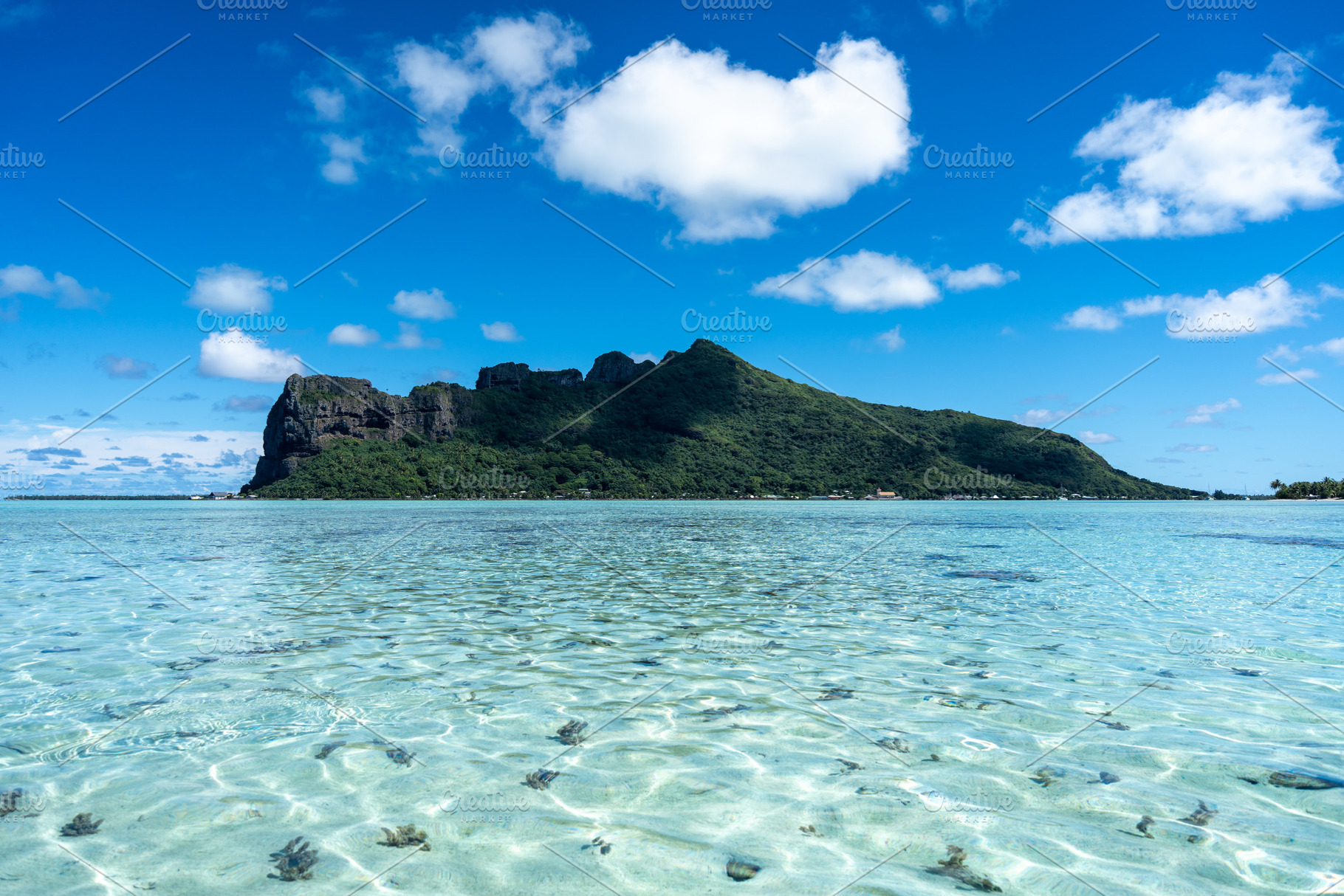 View of Maupiti Island from a white sand beach, French Polynesia, a Nature Photo by GoodGoods