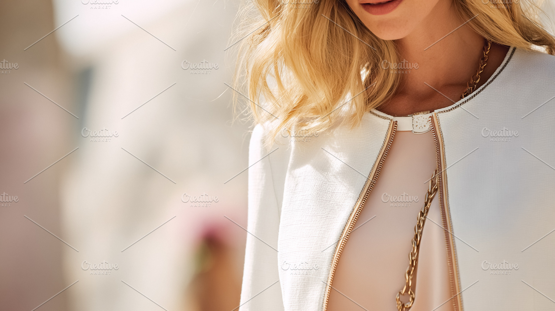 Woman wearing stylish white jacket with golden zipper and chain, a Photo by Studio ANNA