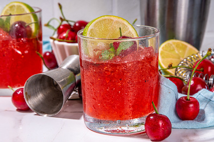 Cherry and lime alcoholic booze cocktail, a Food & Drink Photo by Rimma