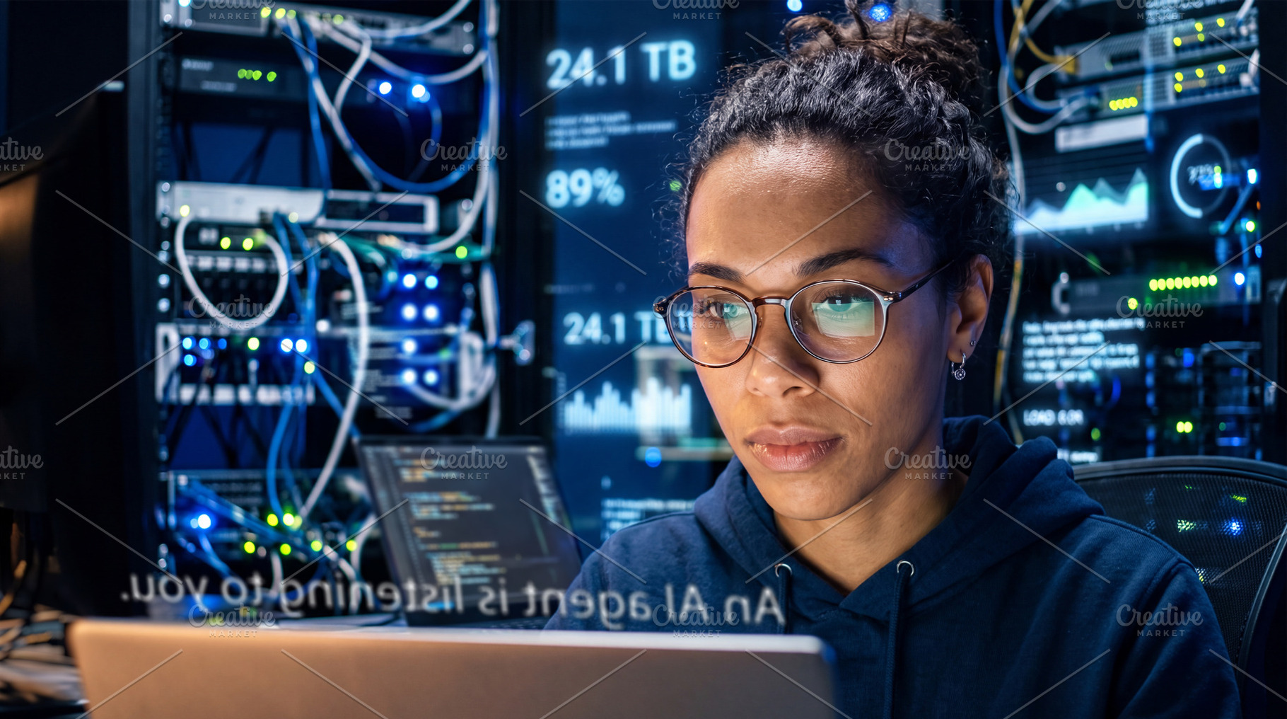 Young mixed race female (mulatto) IT specialist working on lapto, a Technology Photo by Volff