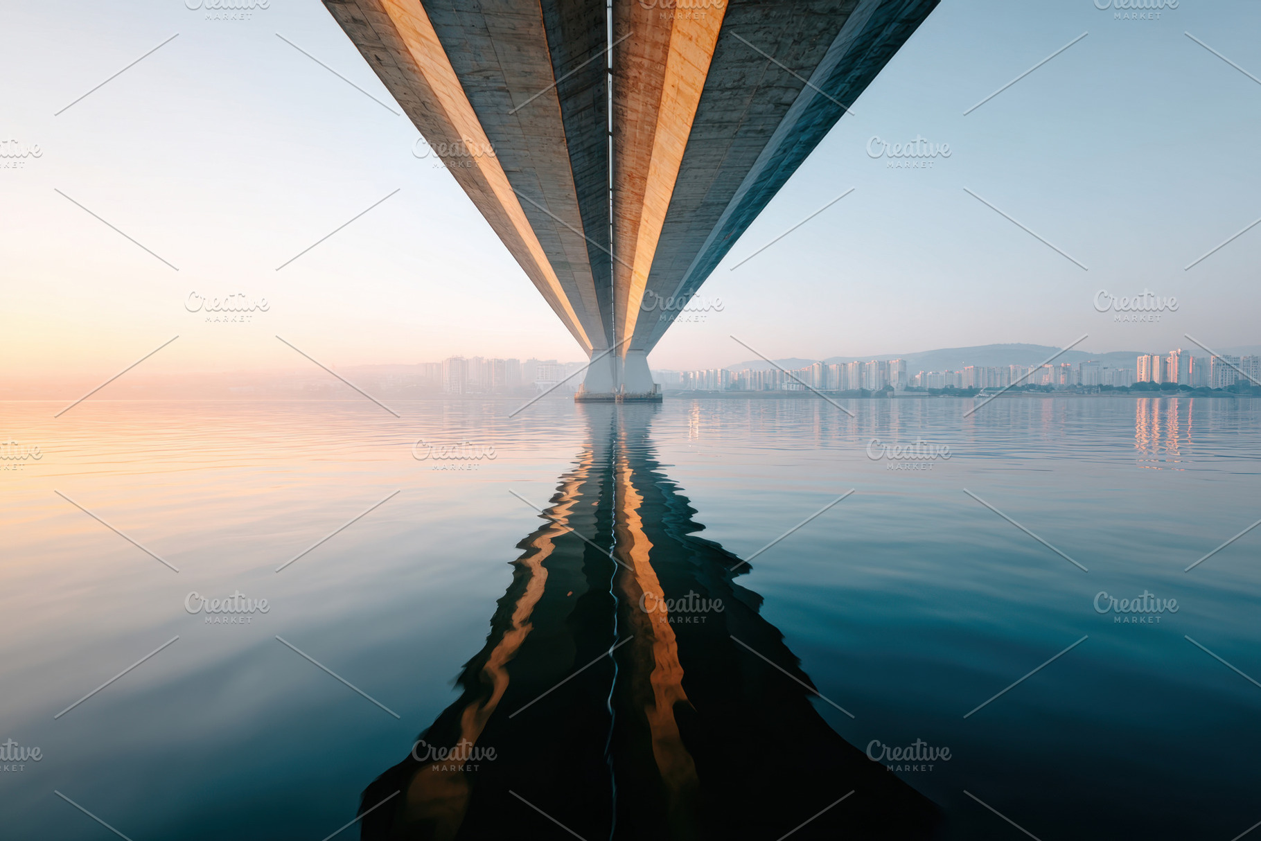 Serene bridge reflection at sunrise, an Architecture Photo by AlyaAnd