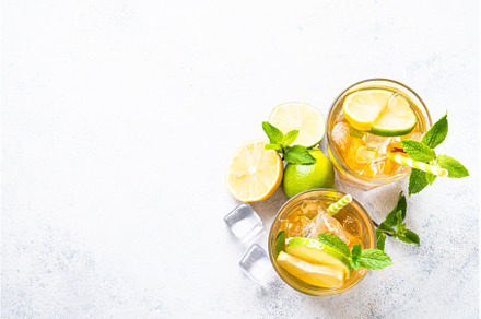 Iced tea with lemon, lime, mint and, a Food & Drink Photo by Nadia-nb