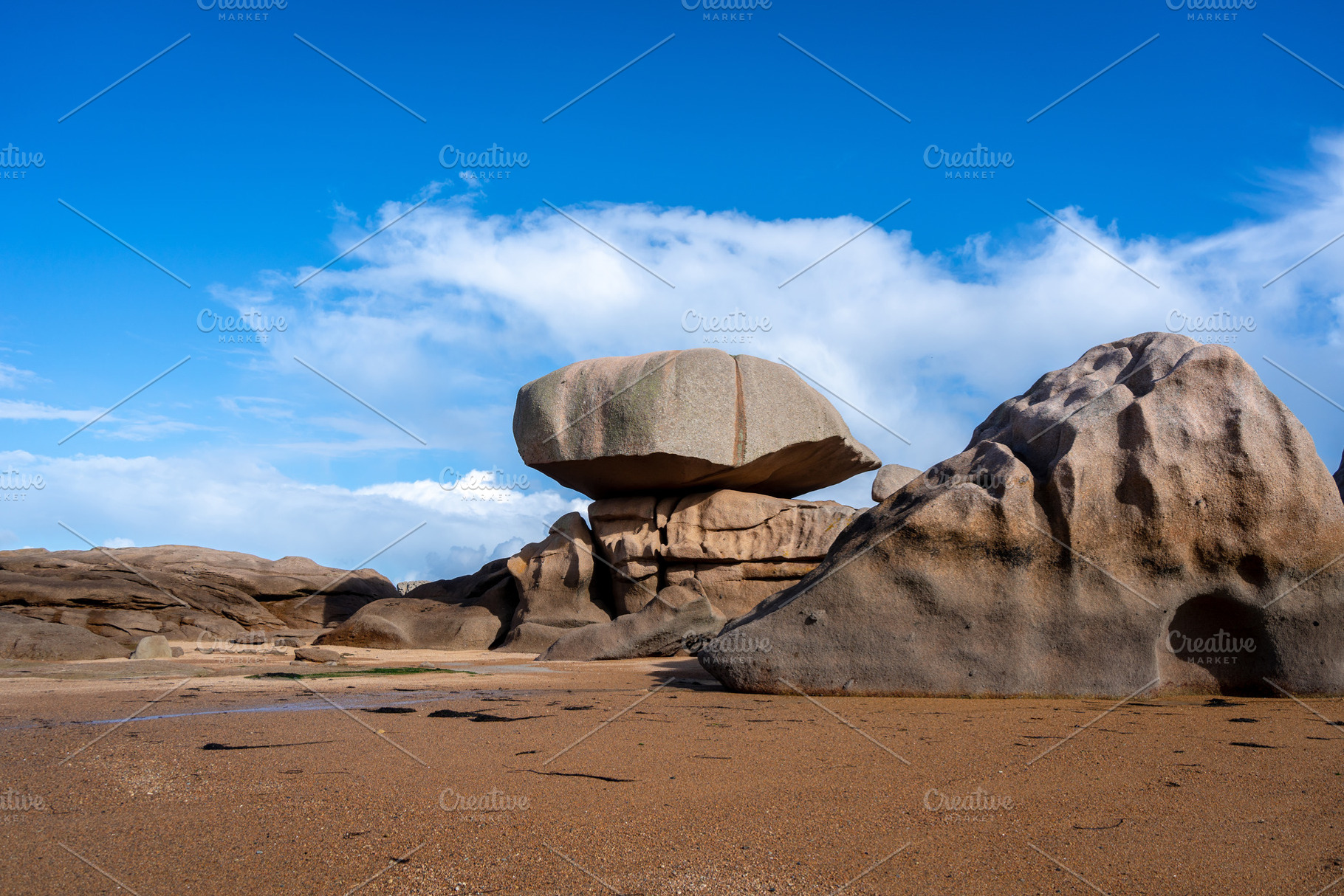 Balanced granite block above sculpted rocks in Tregastel, Britta, a Nature Photo by GoodGoods