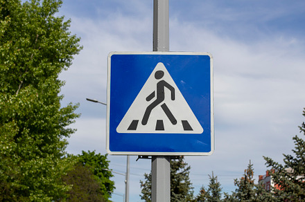 pedestrian crossing sign, a Photo by Anno Urbis
