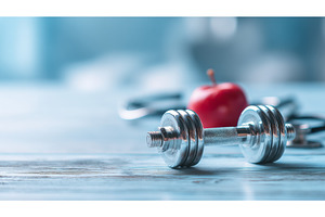 A chrome dumbbell and a red apple, a Sports & Recreation Photo by ZinetroN