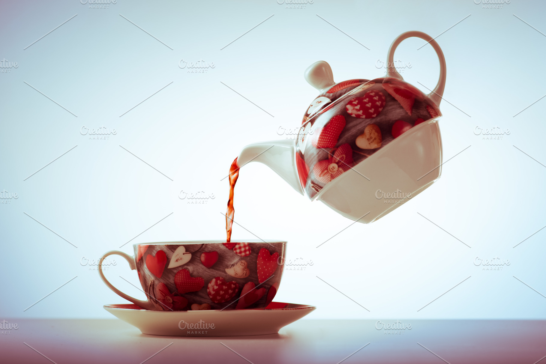 Teapot with cup full of tea, a Food & Drink Photo by MadPhotos