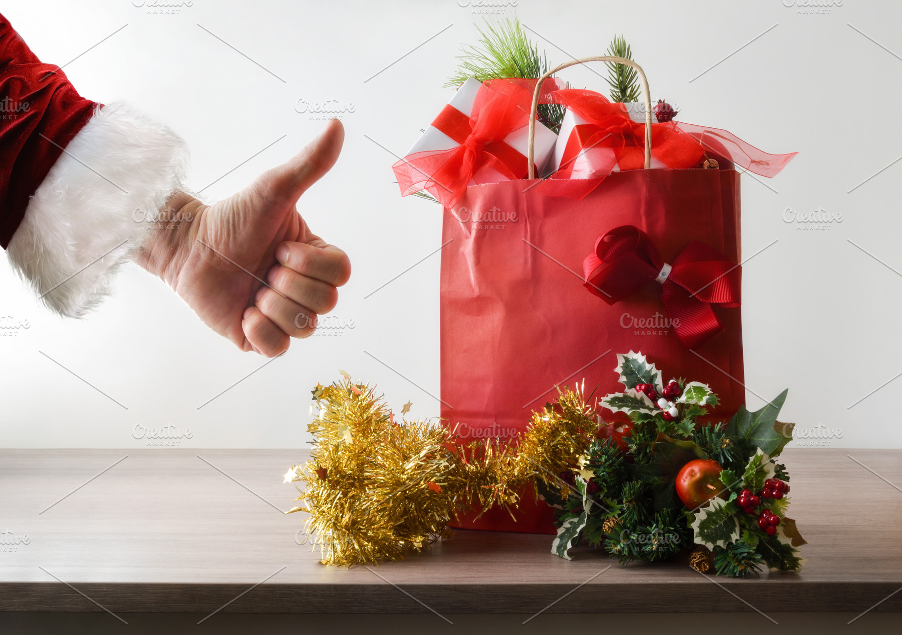 Christmas shopping with red bag and hand with ok gesture, a Holiday Photo by Davizro's Market