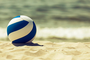 Retro looking ball on the beach, a Holiday Photo by BOOCYS