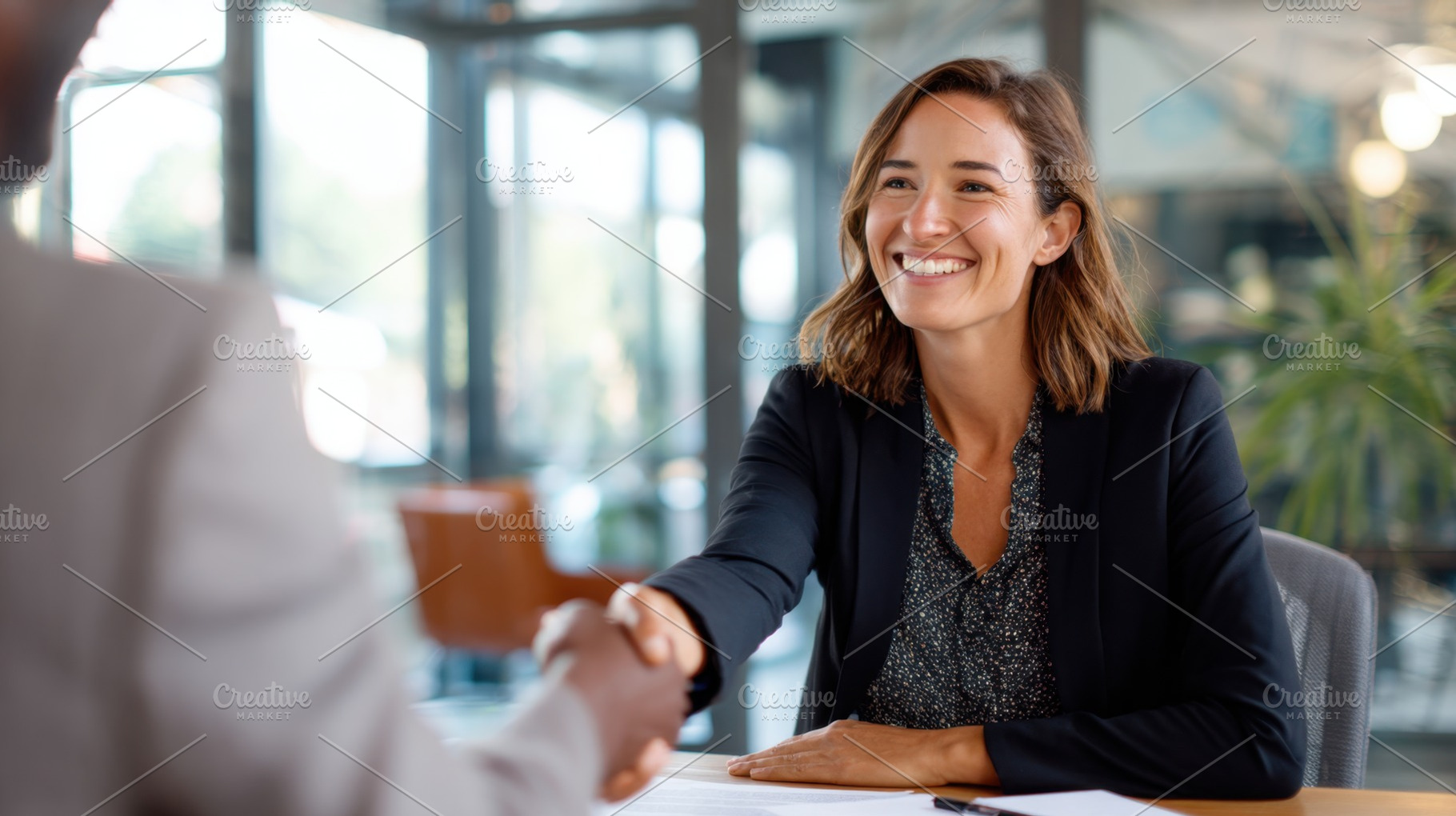 Business meeting with handshake, a Photo by Beautiful things