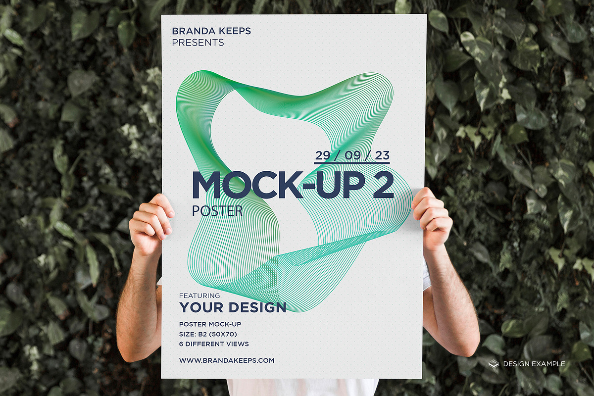 Man Holding Poster 2 Mock-up, a Print Template by Branda Keeps (Photo 6 of 16)