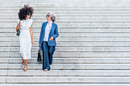 employee and her manager coming home from work, a Business Photo by Iván Moreno STOCK PHOTO