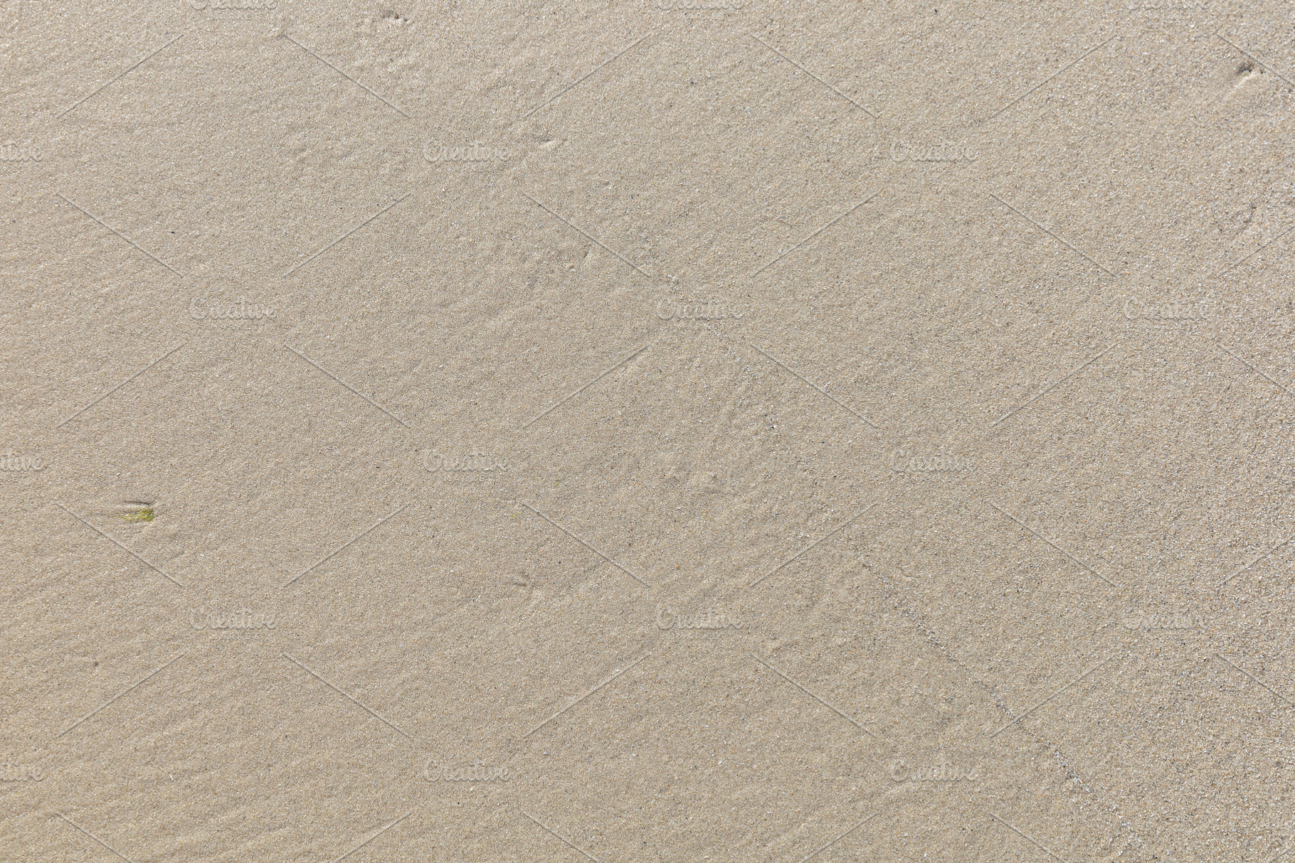 Sand on beach, a Background Photo by Smith Chetanachan