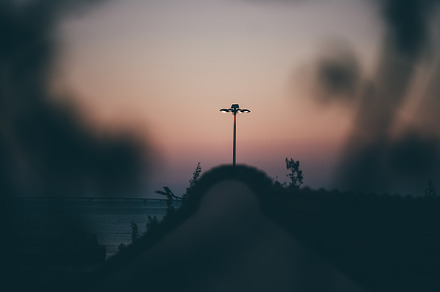 Streetlamp at sunset by the water, a Wallpaper Photo by SkyNext