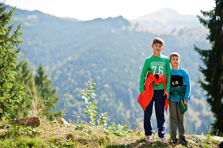 Brothers hike in the mountains, children are walking along a mou, a Nature Photo by AS photostudio