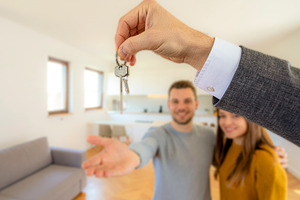 Handing over keys to new homeowners, a Person Photo by DanFLCreativo