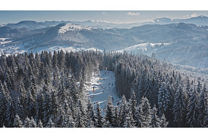 Skiers enjoying winter sports on, a Nature Photo by Goinyk