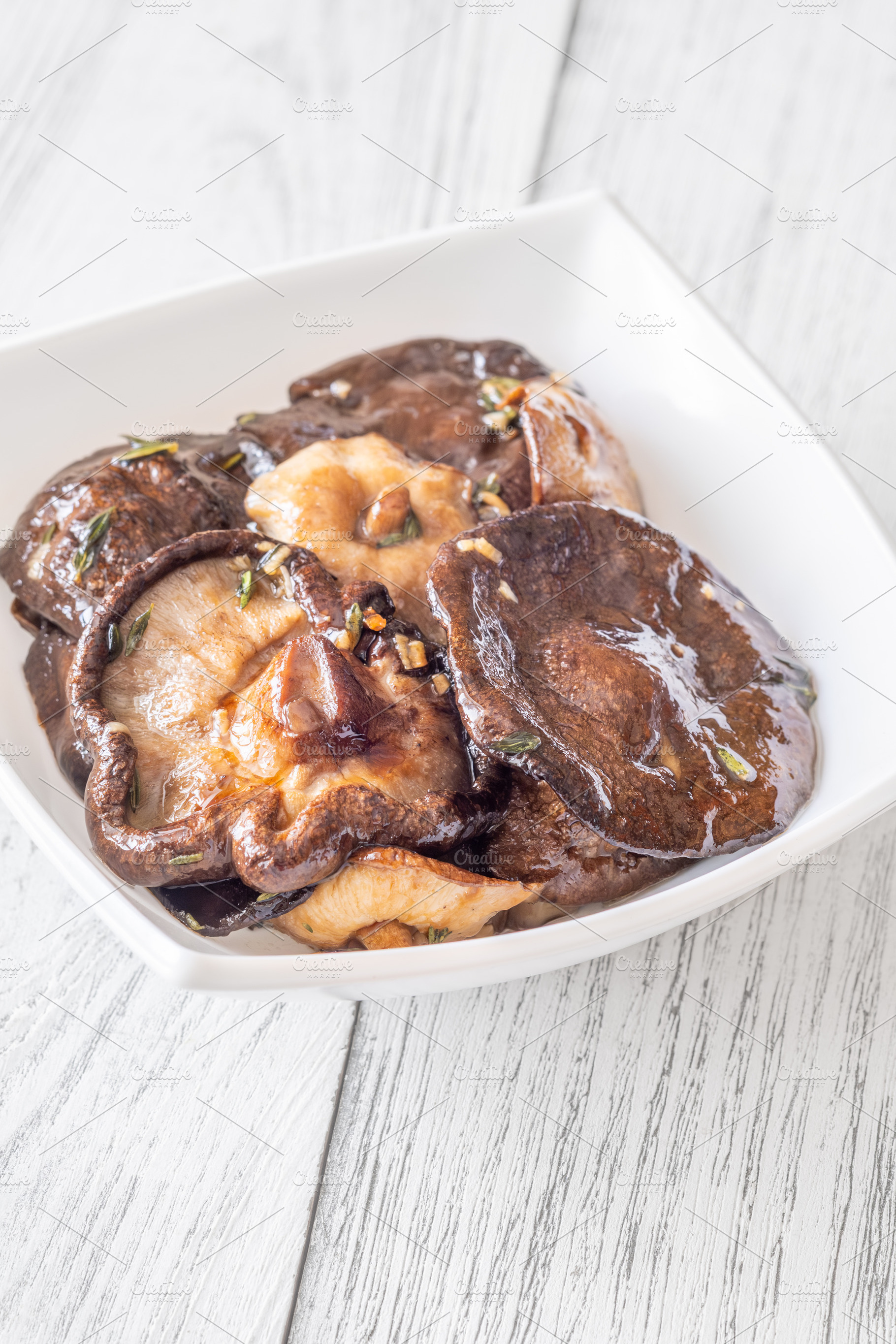 Crispy fried garlic thyme shiitake, a Food & Drink Photo by Alexander Prokopenko