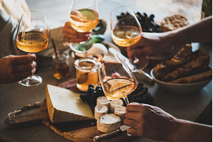 Hands of people holding wineglasses, a Food & Drink Photo by Foxys