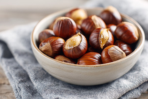 Fresh chestnuts in a ceramic bowl, a Food & Drink Photo by MistyDay