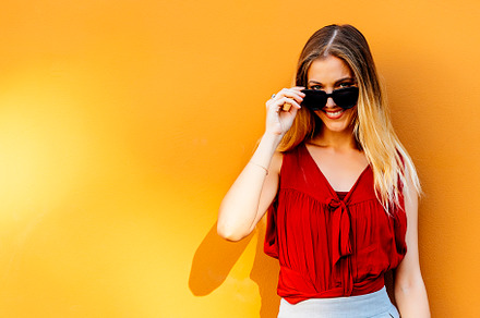 Portrait of beautiful young woman stock photo containing woman and wall, a Person Photo by nunezimage