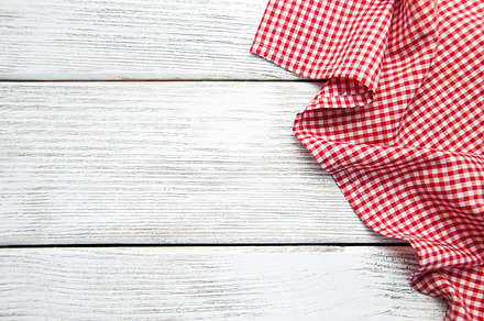 Red napkin containing wooden, background, and table, an Abstract Photo by Olena Rudo