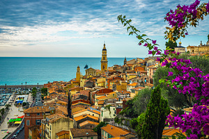 Cityscape and blooming bougainvillea, an Architecture Photo by Alpine Dreams
