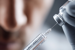 Medical syringe drawing liquid from, a Health & Medical Photo by MistyDay