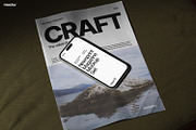 Newsprint with Smartphone Mockup, a Books & Magazine Mockup by Mocku (Thumbnail 1 of 4)