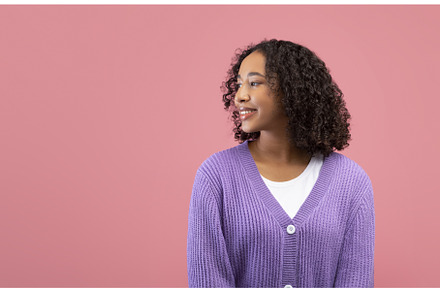 Pretty young black lady in casual, a Person Photo by Prostock-Studio