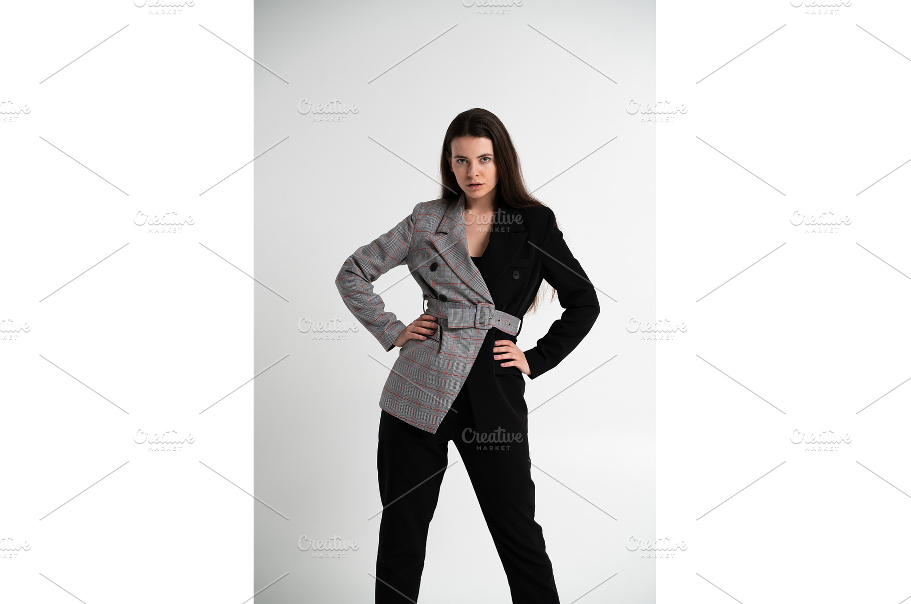Young businesswoman standing with, a Business Photo by volodymyrshtun13795