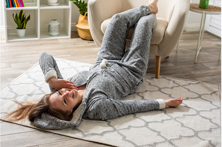 Beautiful girl laying on a floor, a Person Photo by oksix