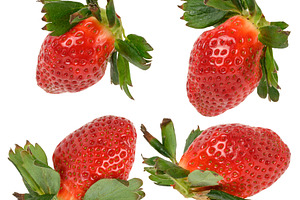 Large ripe strawberry berry with green sepals and leaves on an i, a Food & Drink Photo by ndanko