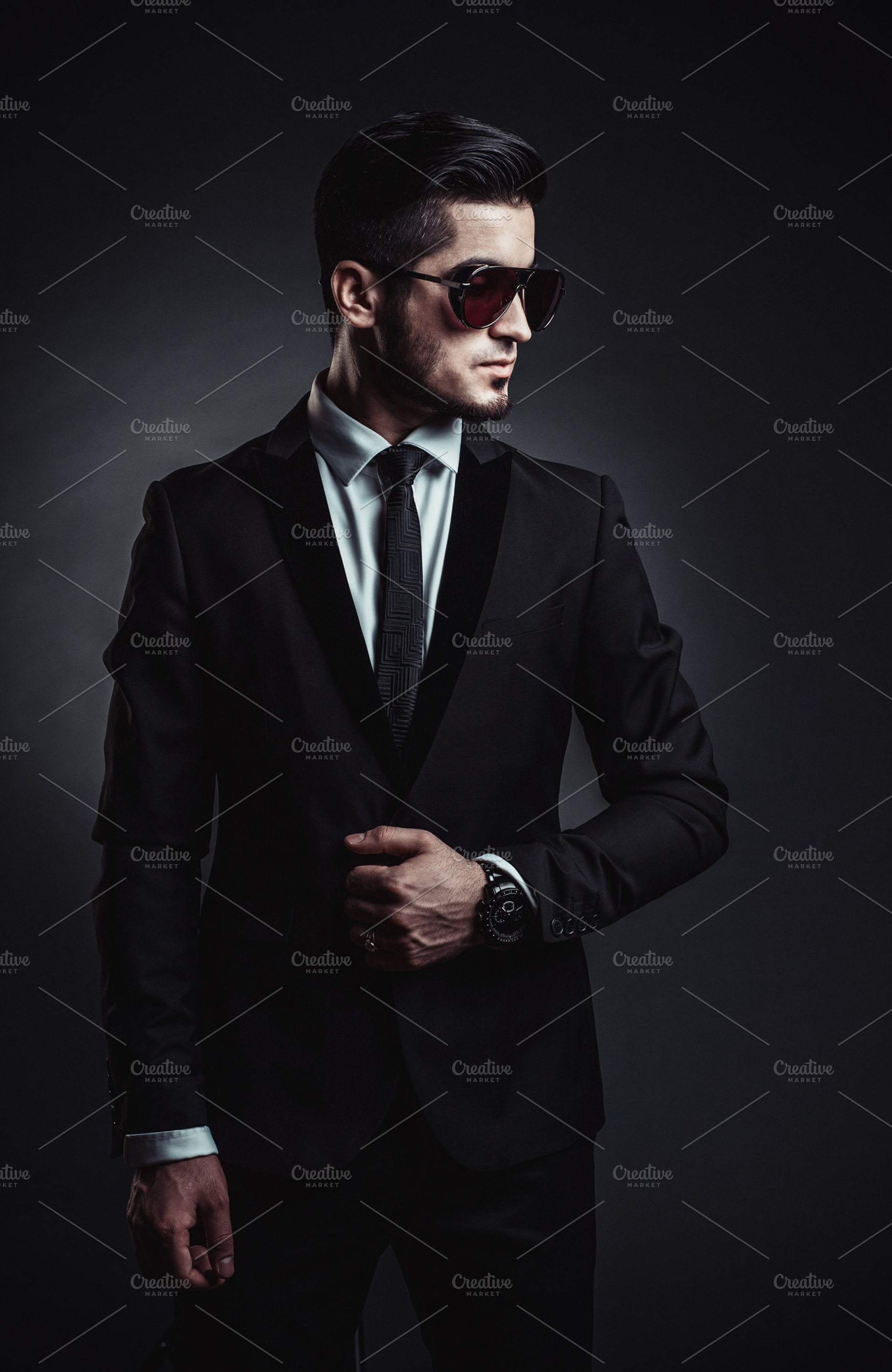 Stylish man in studio containing fashion, man, and suit, a Beauty & Fashion Photo by MaxFrost