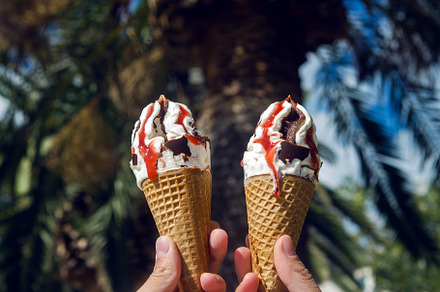 two ice cream cones with chocolate and jam, a Food & Drink Photo by SaulichPhoto