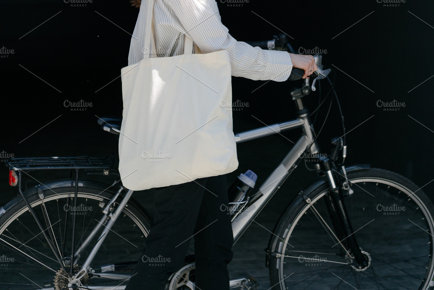 Woman holding eco bag or cotton tote, a Photo by 5max
