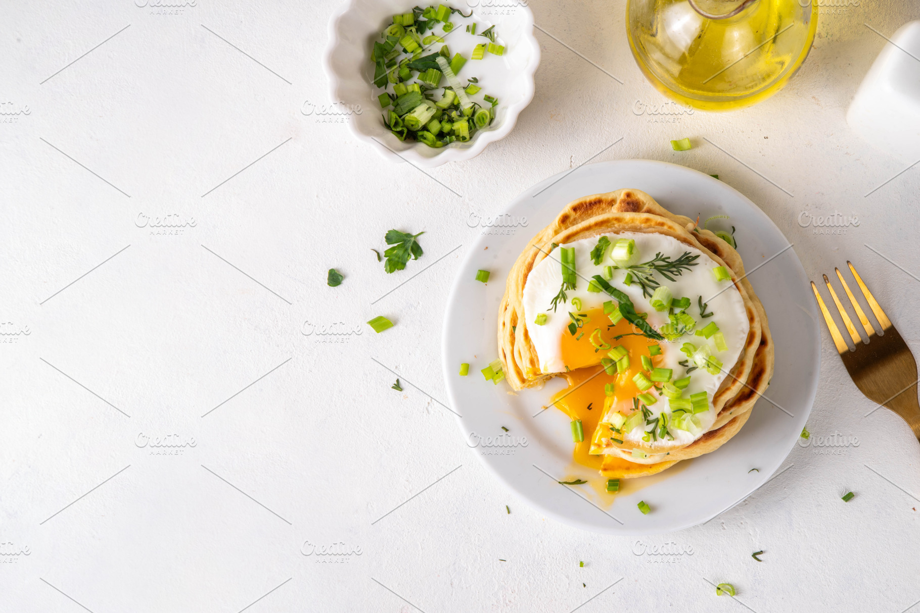 Tasty savory breakfast pancakes with spring green onion and frie, a Food & Drink Photo by Rimma