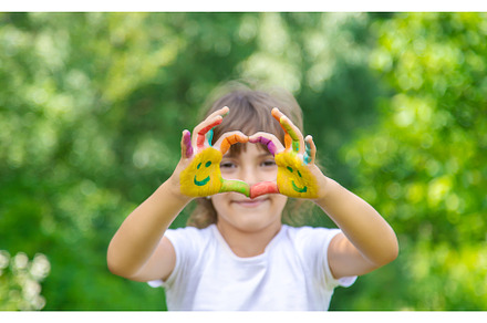 Child hands in paints a smile, an Arts & Entertainment Photo by yanadjana