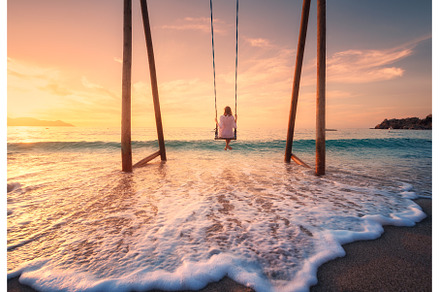 Happy young woman on wooden swing in, a Person Photo by den-belitsky